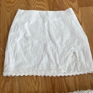 White urban outfitters/LA hearts flowery mini skirt size medium.